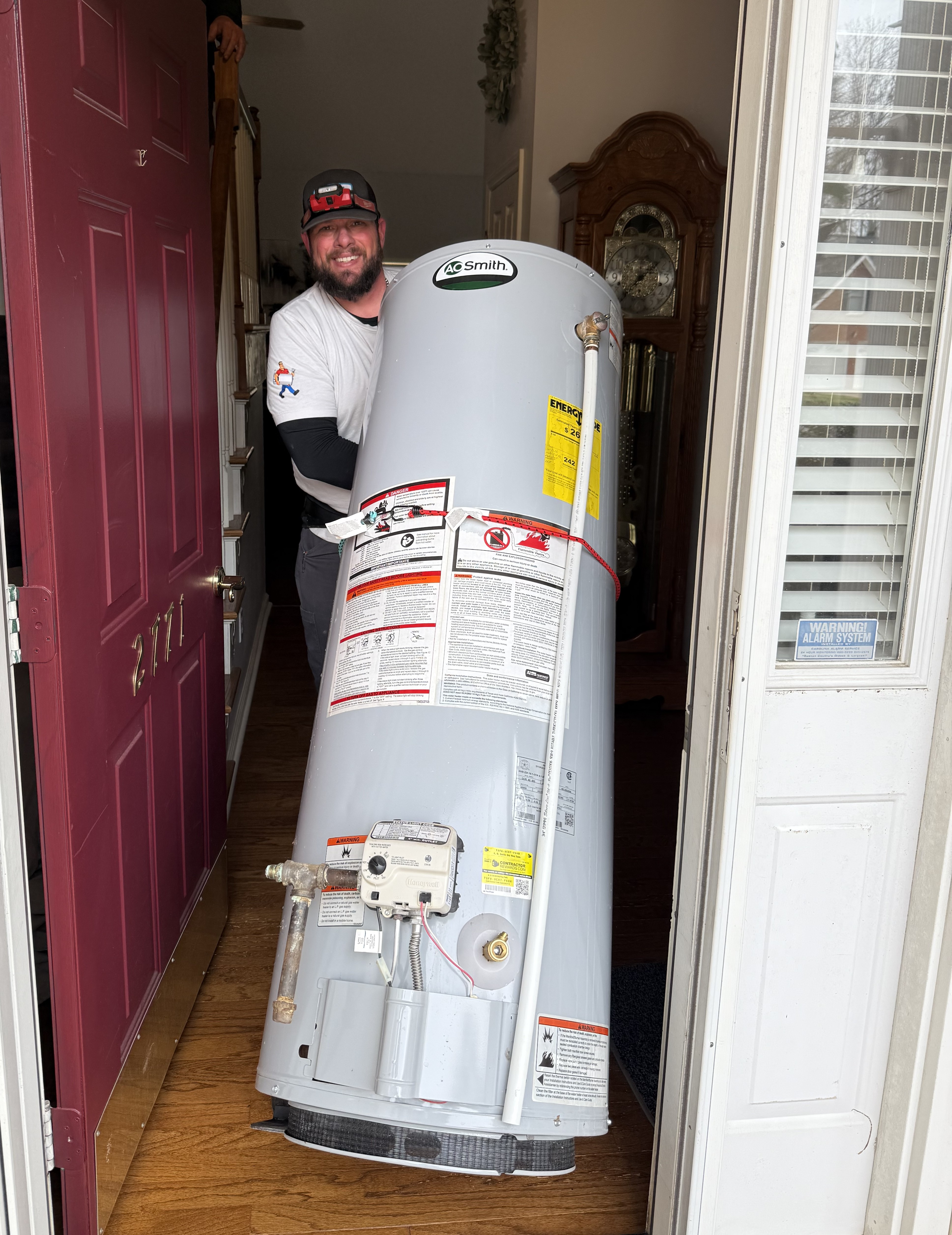 Water Heater Express technician Matt delivering new water heater to Statesville home